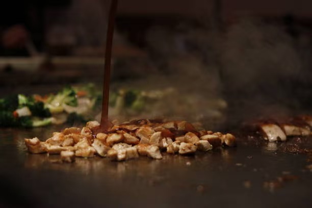 Chef preparing teppanyaki